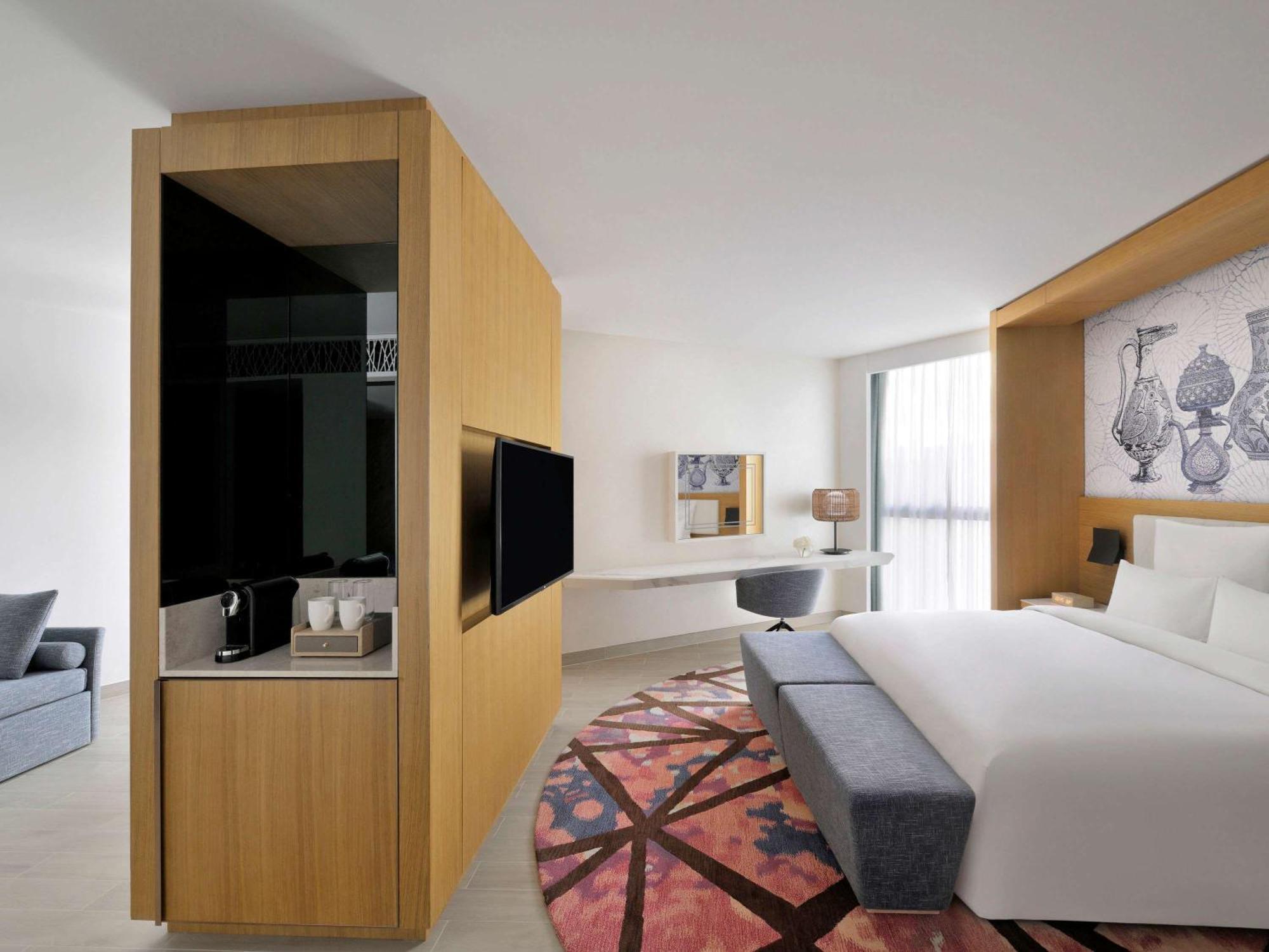 Moevenpick Hotel & Apartments Ghala Maskat Exterior foto Deluxe room