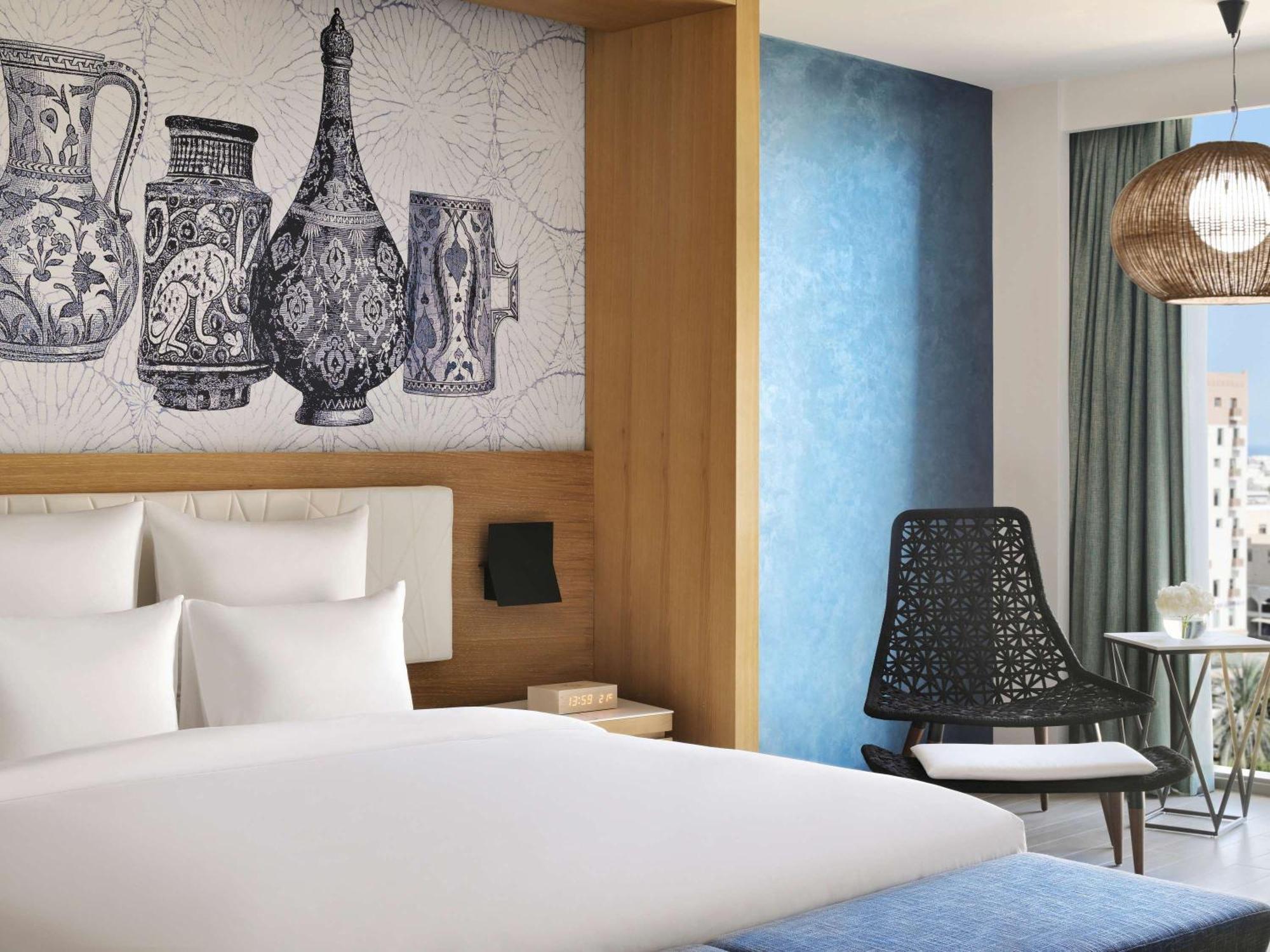 Moevenpick Hotel & Apartments Ghala Maskat Exterior foto Deluxe Room